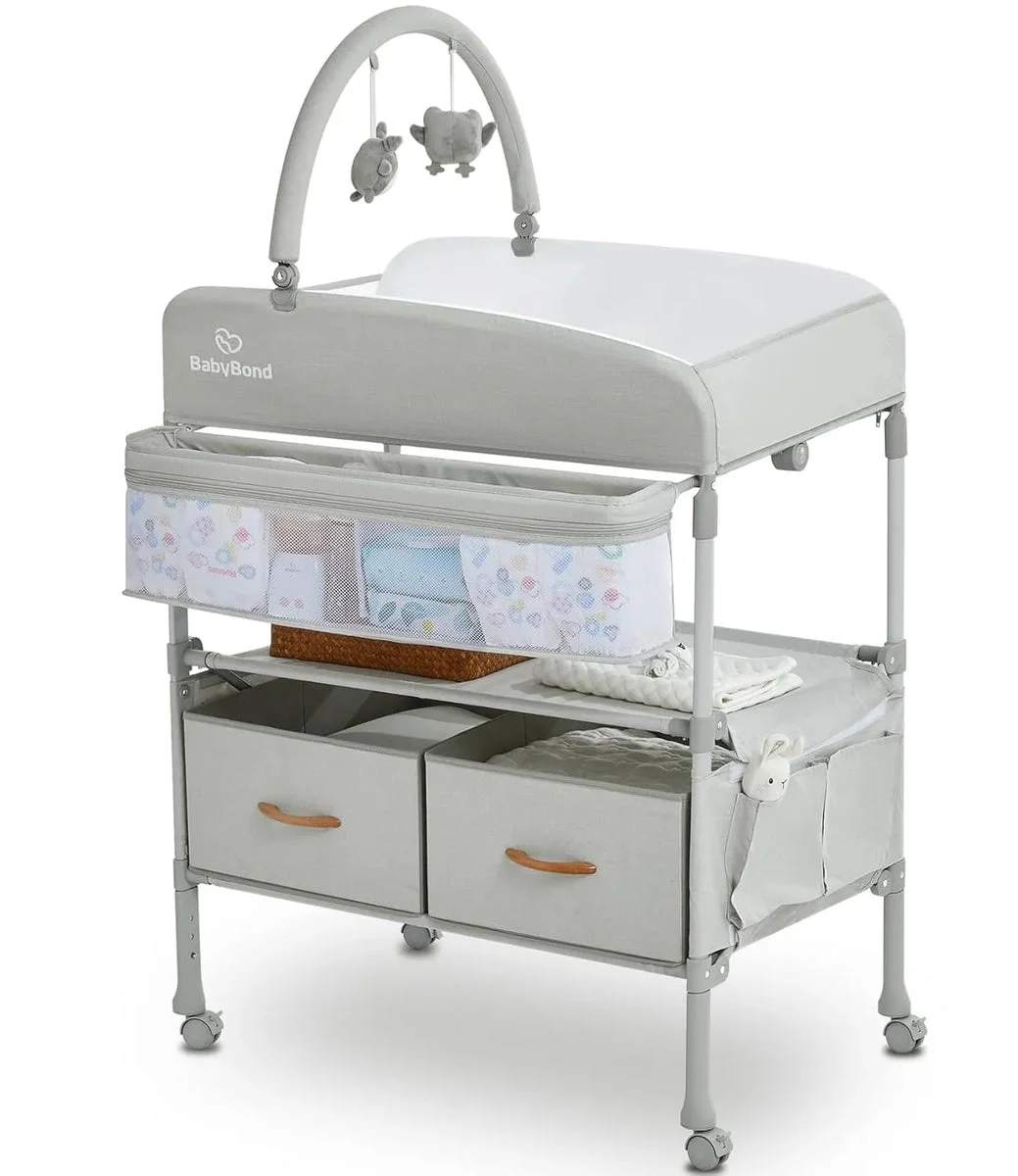BabyBond Portable Baby Changing Table with 2 Storage Baskets.